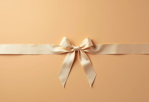 베이지 배경의 리본 선물